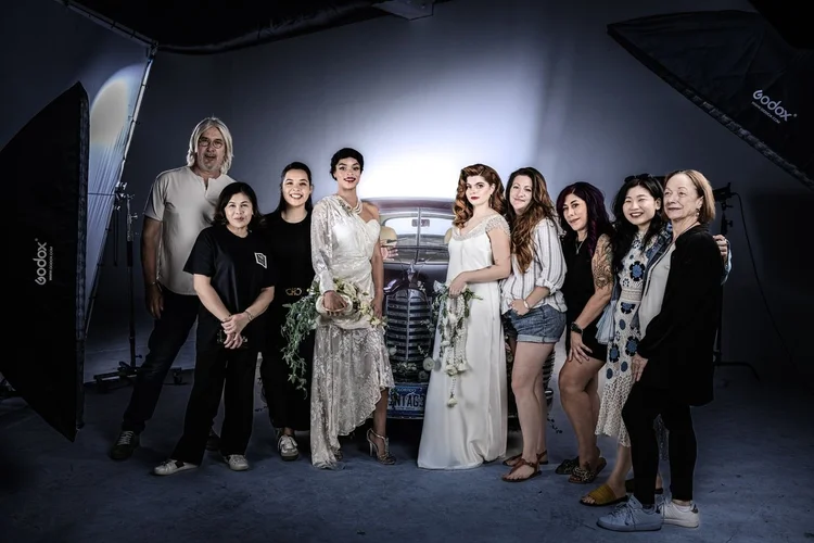 Behind the scenes: the team with both models in the studio