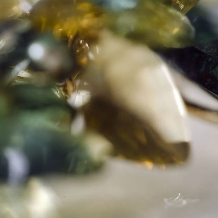 Color macro of yellow and green briolettes in soft focus