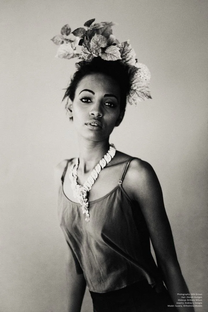 Black and white: a model with a floral headdress and an Andrea Li necklace over a camisole