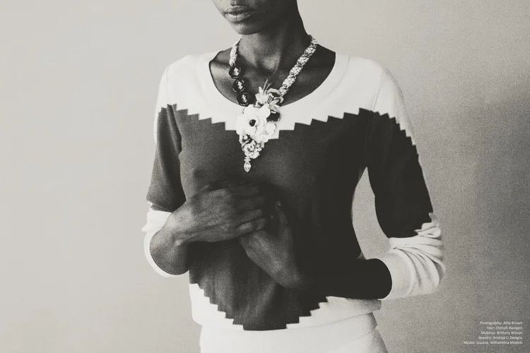 Black and white close view of the zigzag sweater and the Andrea Li necklace