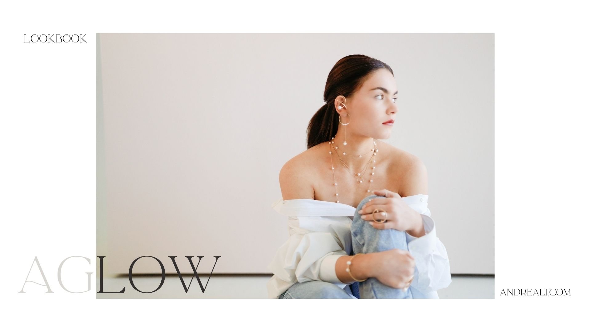 Aglow lookbook cover featuring a seated model in an off-shoulder white top and jeans, wearing layered pearl necklaces, delicate pearl earrings, and minimalist jewelry against a soft neutral backdrop.