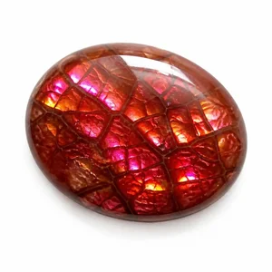 Fire agate cabochon with iridescent flash