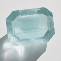 Milky aquamarine with a soft cloudy blue texture