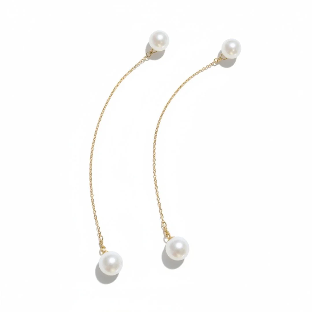 14k gold two pearl drop earrings.jpg