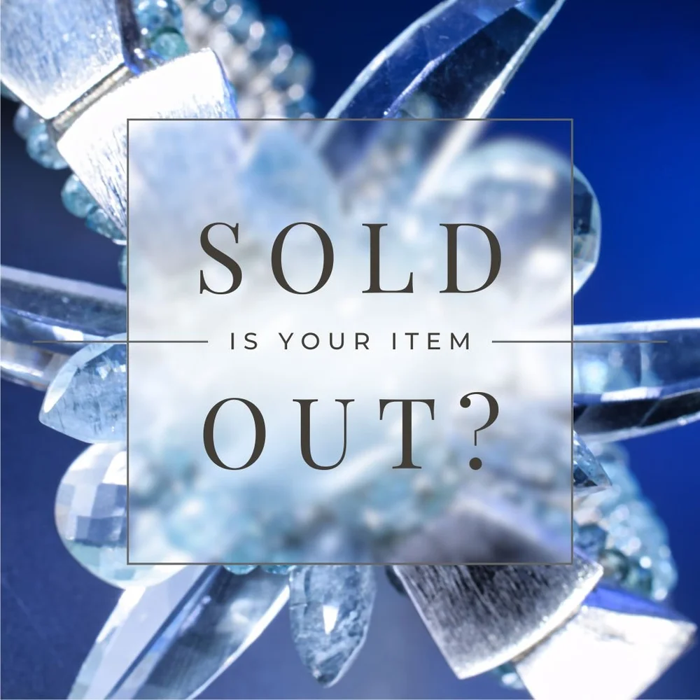 “SOLD: is your item out?” text overlay in a translucent box on a blue-toned close-up of faceted light-blue gemstones and silver jewelry.