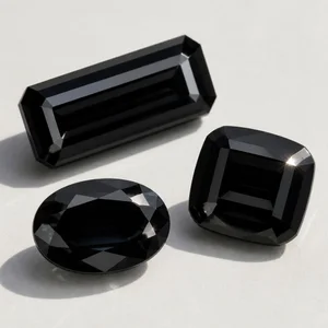 Illustration of faceted black tourmalines