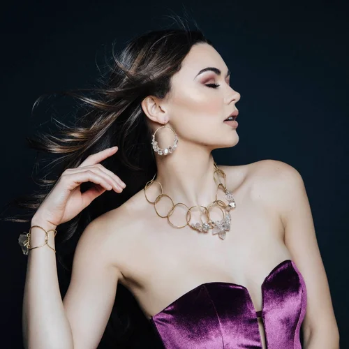 A model wearing one Andrea Li statement necklace on its own