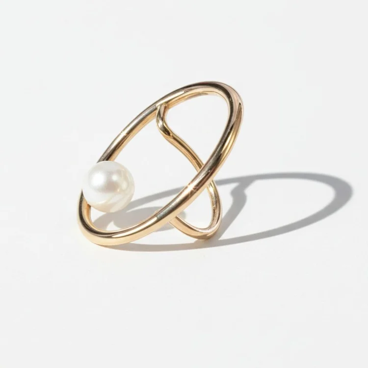 Minimal gold circle ring with a single pearl