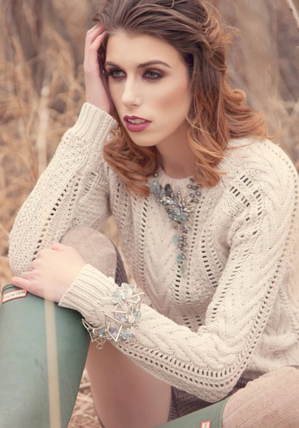 model wearing pastel gemstone necklace and bracelet