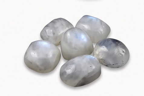 B and AB craft grade rainbow moonstone, opaque milky tumbled stones with weak adularescence