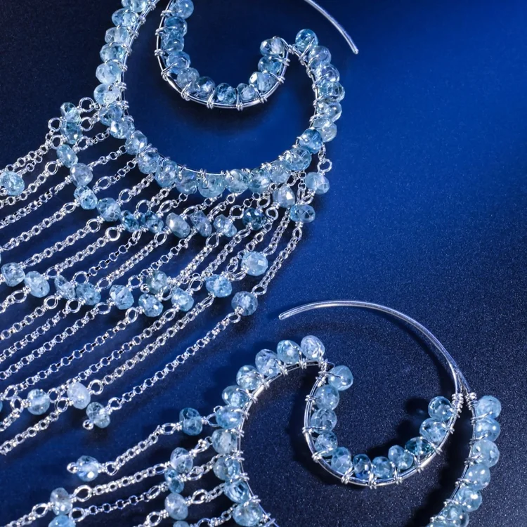 Silver chain fringe earrings with crescent hoops of blue stones