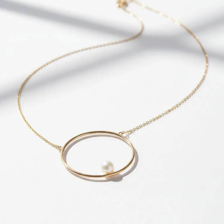Minimal gold circle pendant necklace with a pearl