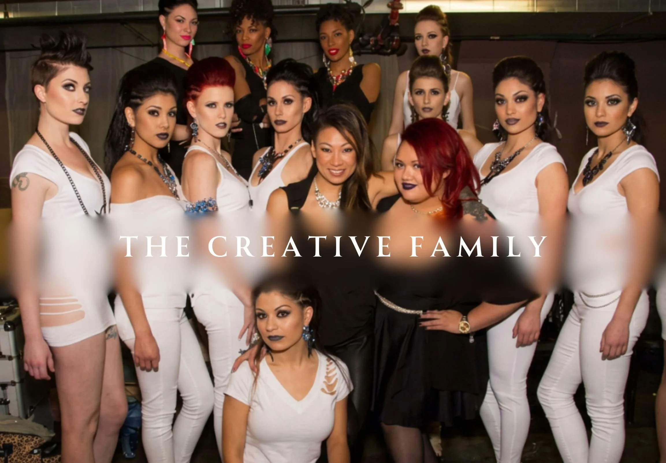 Group portrait of jewelry models and creative collaborators in black and white outfits, wearing bold statement pieces backstage.