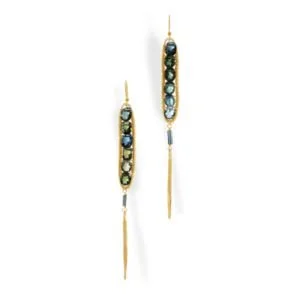Long drop earrings: a gold bar set with dark green gemstones ending in a gold spike, by Andrea Li