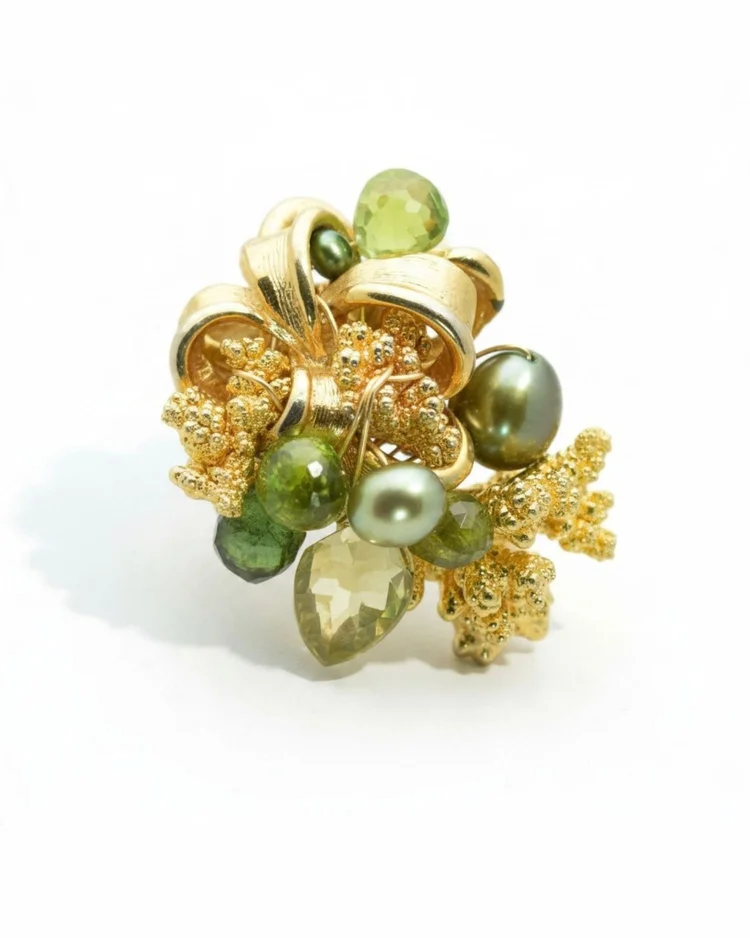 Andrea Li cocktail ring: gold leaves, green pearls and peridot on a textured gold base, by Andrea Li