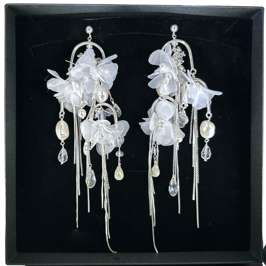 Laura boxed earrings.png