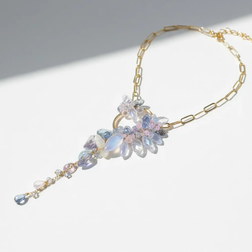 Blue Hour, a one-of-a-kind rainbow moonstone marquis and gold-filled oval pendant necklace by Andrea Li