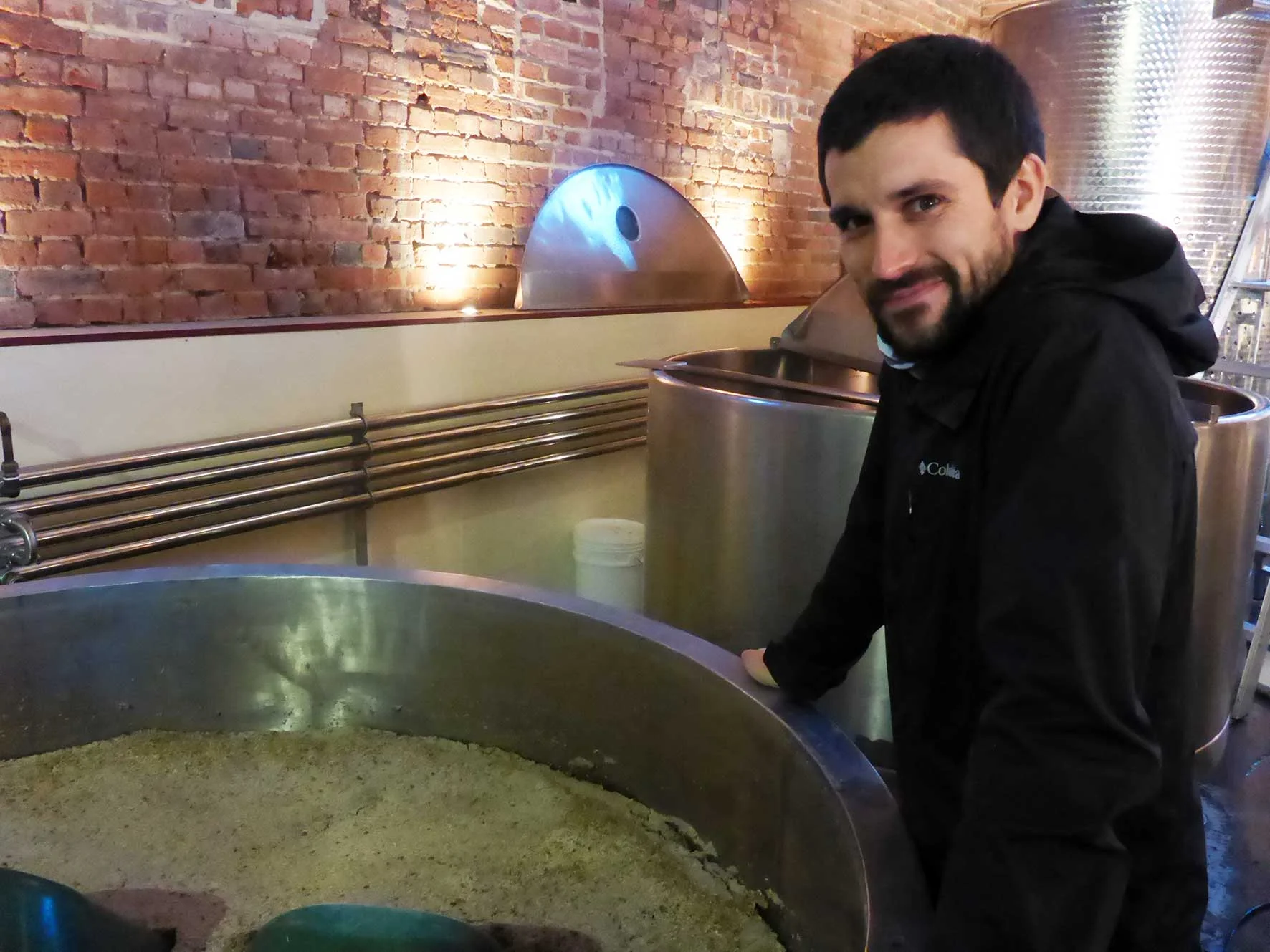 Chris checking the mash at Redlands Distillery School