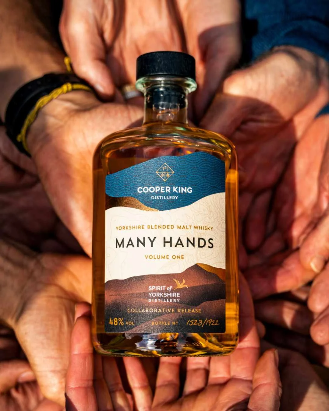 The Story Behind the Many Hands Bottle