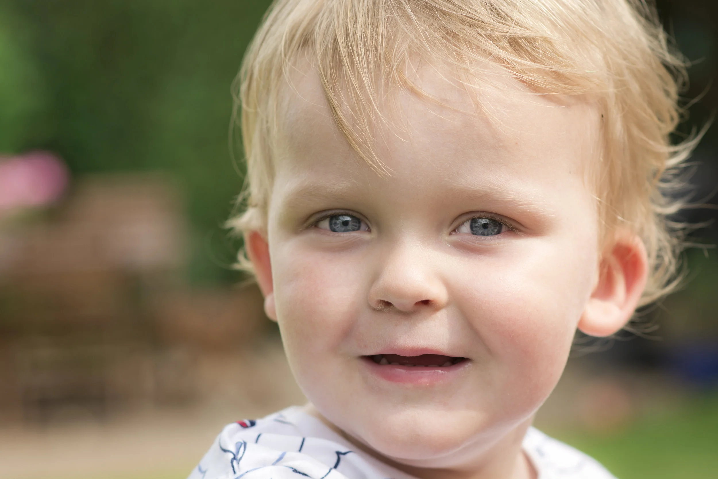 boy smiling outdoor photoshoot