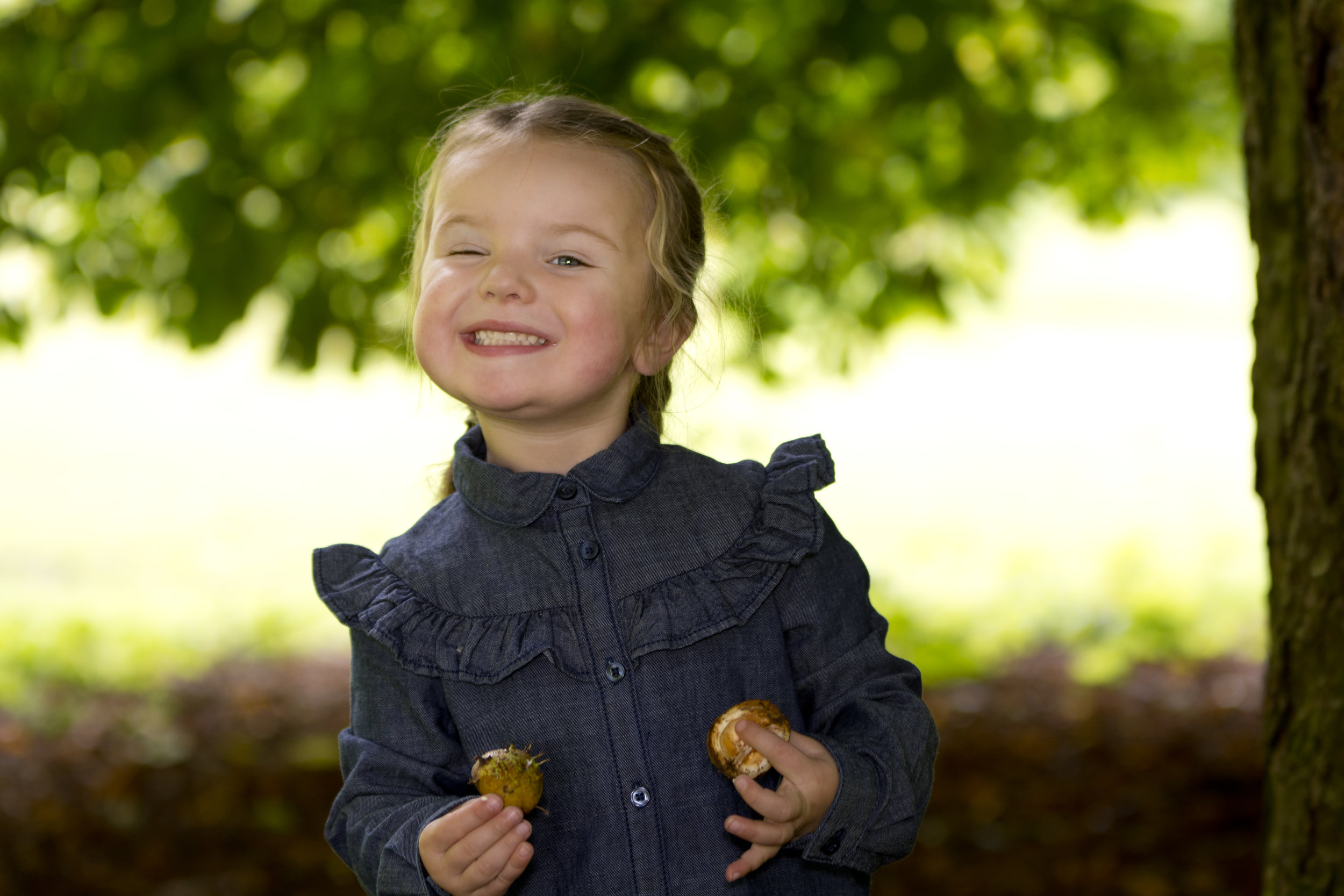 smiling child outdoor photoshoot