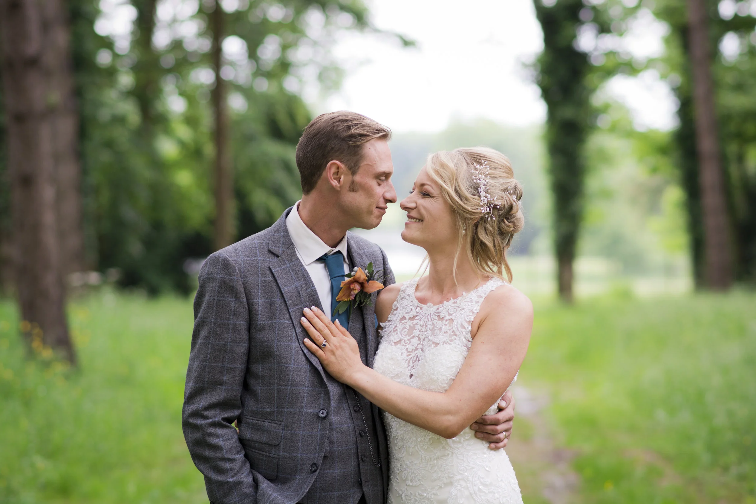 wedding bride groom smiling each other