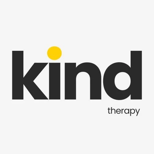 Modern black text reading 'kind.' with a yellow dot, highlighting compassionate therapy services.