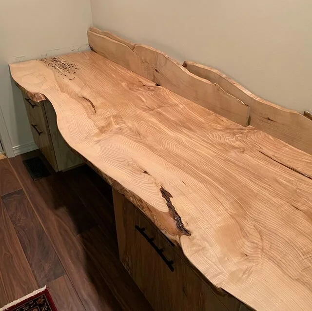 Custom American Ash desk. Cabinets, desk slab and backsplash all from two enormous matching slabs. Hand shaped Wenge pulls accenting the raw organic form of the desk. Just getting the free flowing backsplash planned out in these shots. #americanash#c