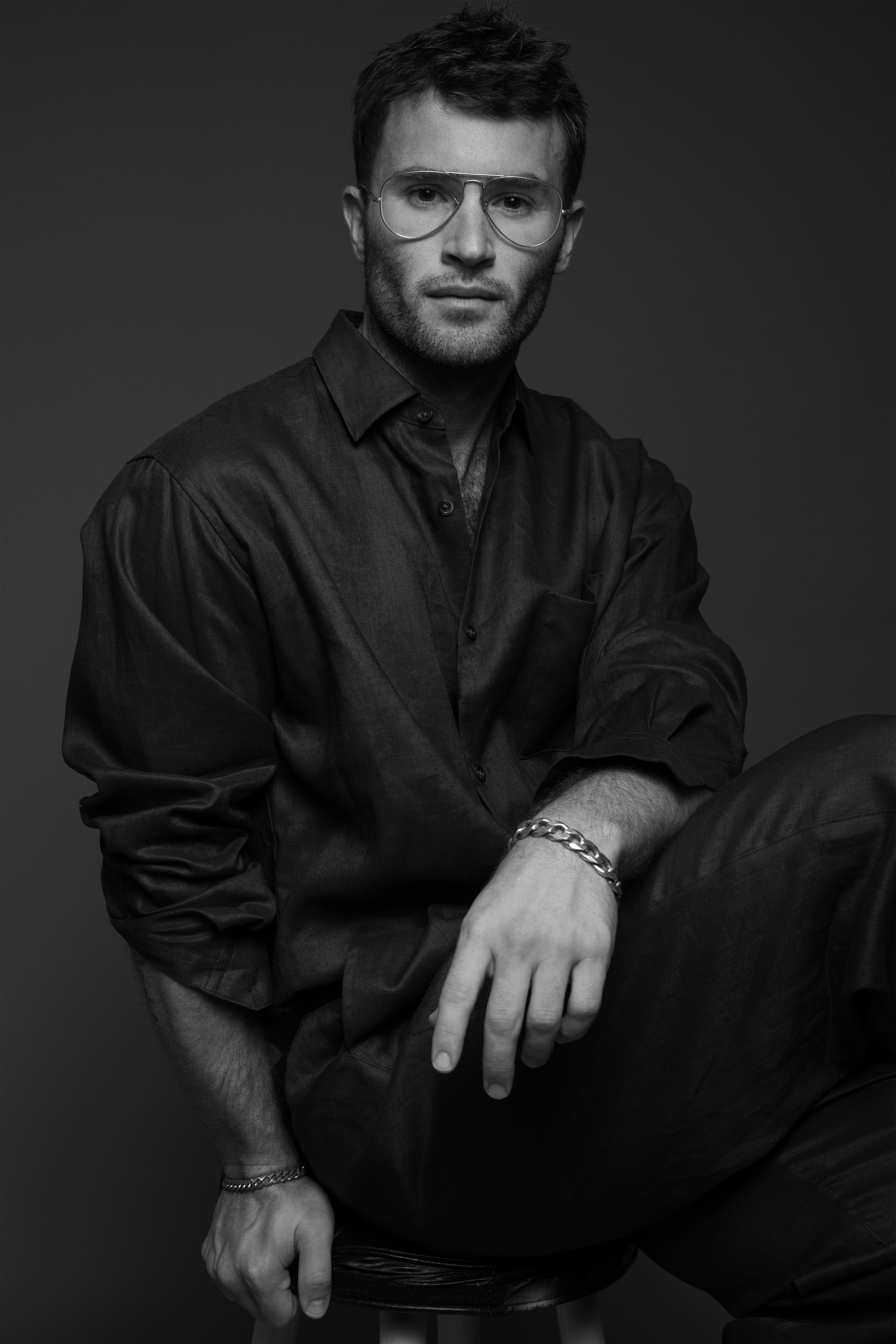 A black and white portrait of Interior Design Benjamin Stelly by fashion and beauty photographer Tony Veloz.