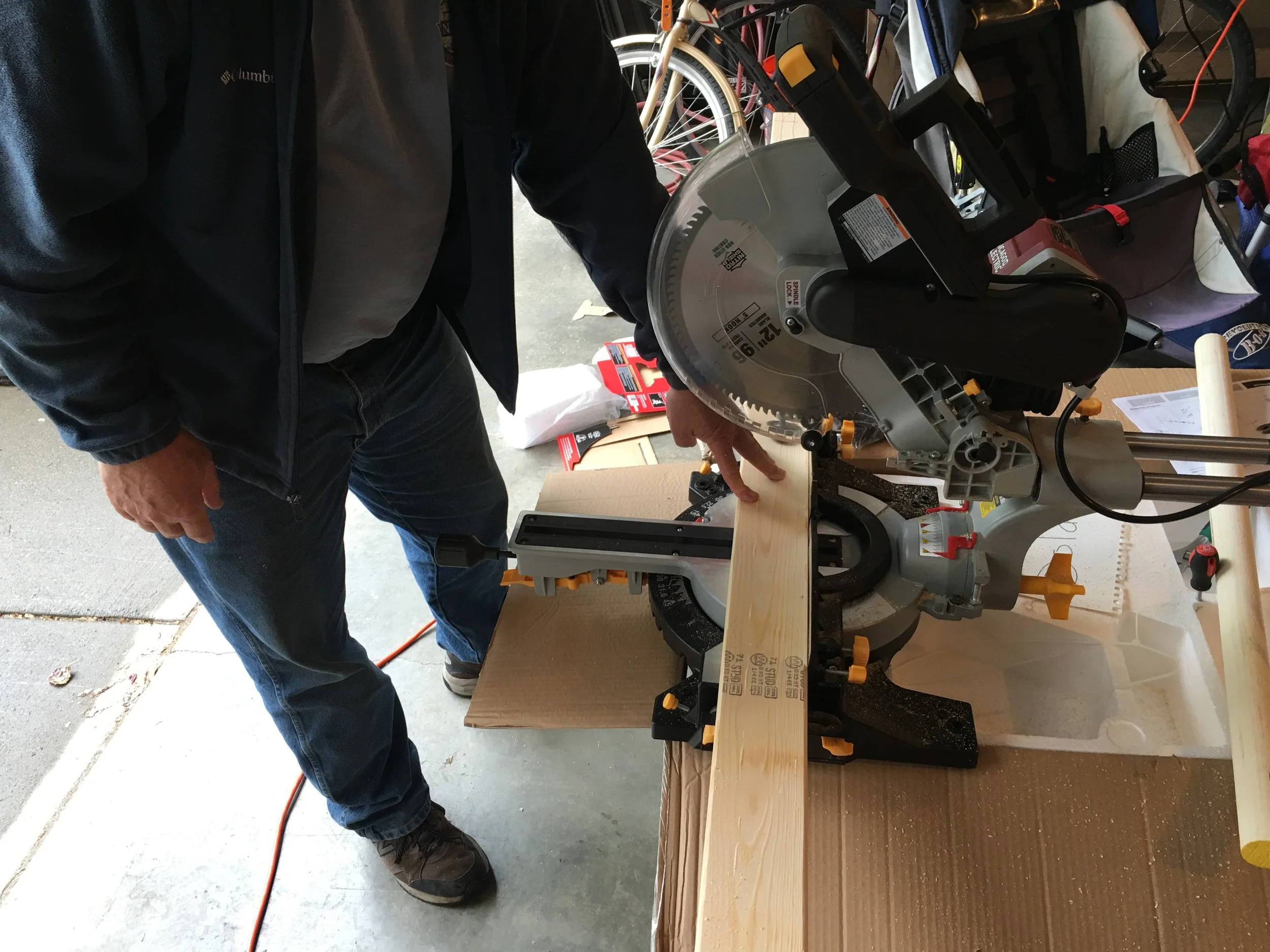 My dad manning the miter saw.