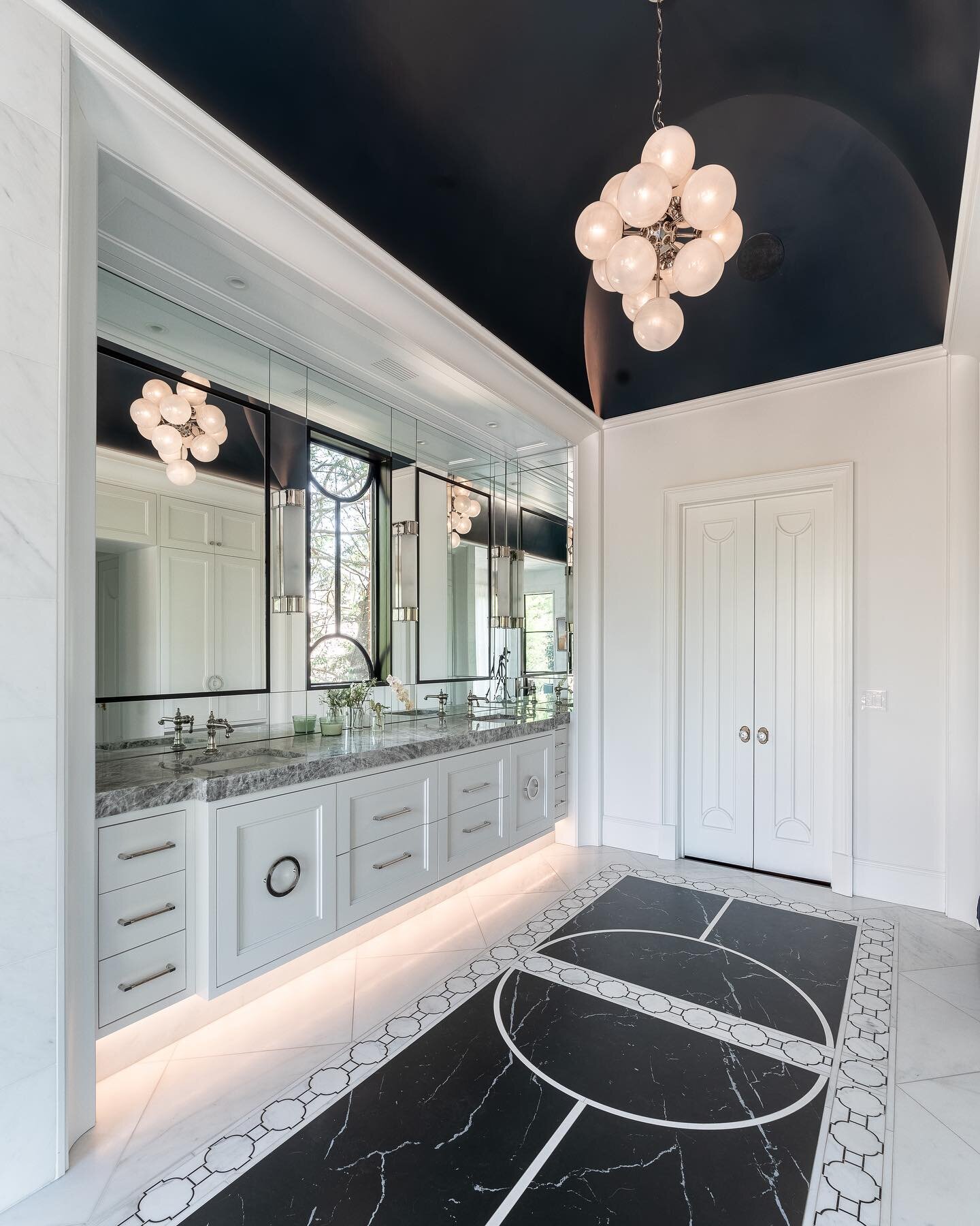 This bathroom was inspired by a Mediterranean day at the beach and we just love the underlit floating vanity and geometric black and white floor

Swipe for a surprise friend in his custom made bed nook 🐶

Designers: @studioentourage // @specialized_