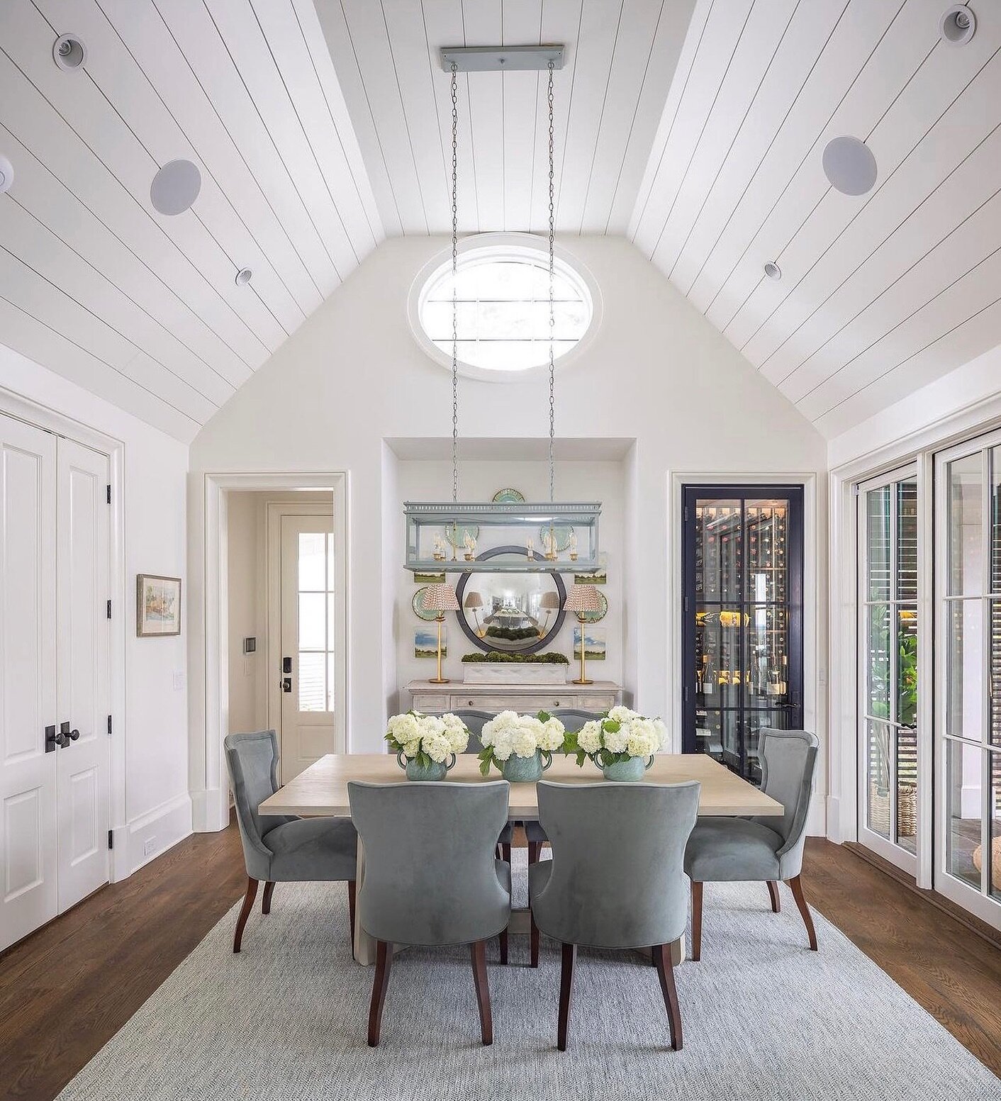 Grab a bottle of wine from your wine closet and enjoy a glass of wine with friends in this lovely low country inspired dining room

Designer: @studioentourage 
Builder: @livingstonfinehomes 
Photographer: @davidcannonarchitectural