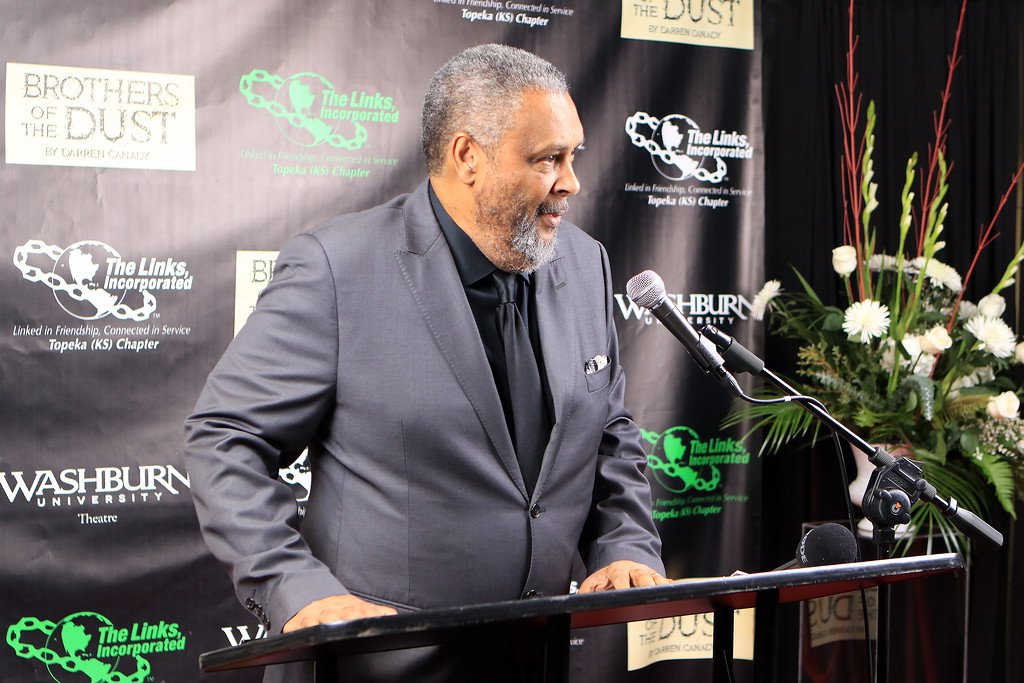 Tribute Speaker Kevin Willmott, Oscar winning screenwriter, proposes a toast in honor of playwright Darren Canady, BOTD Kansas Premier Opening Night Afterglow.jpg