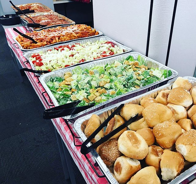 Italian style lunch with marinara braised chicken on the bone, pasta, Caesar salad, cucumber salad and freshly baked rolls &amp; butter 🇮🇹