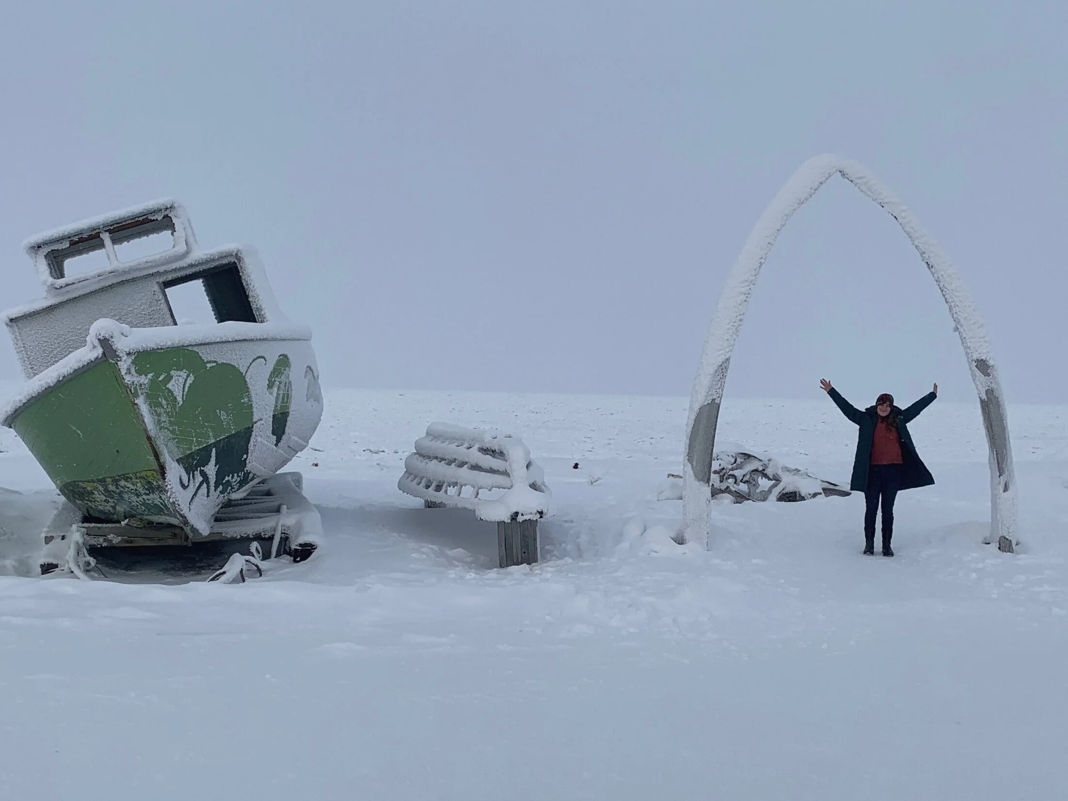 I’m underneath a bowhead whalebone. Behind me is the Arctic Ocean. Bowheads have the largest mouth of any animal, which they use to break through the frozen Arctic sea ice.