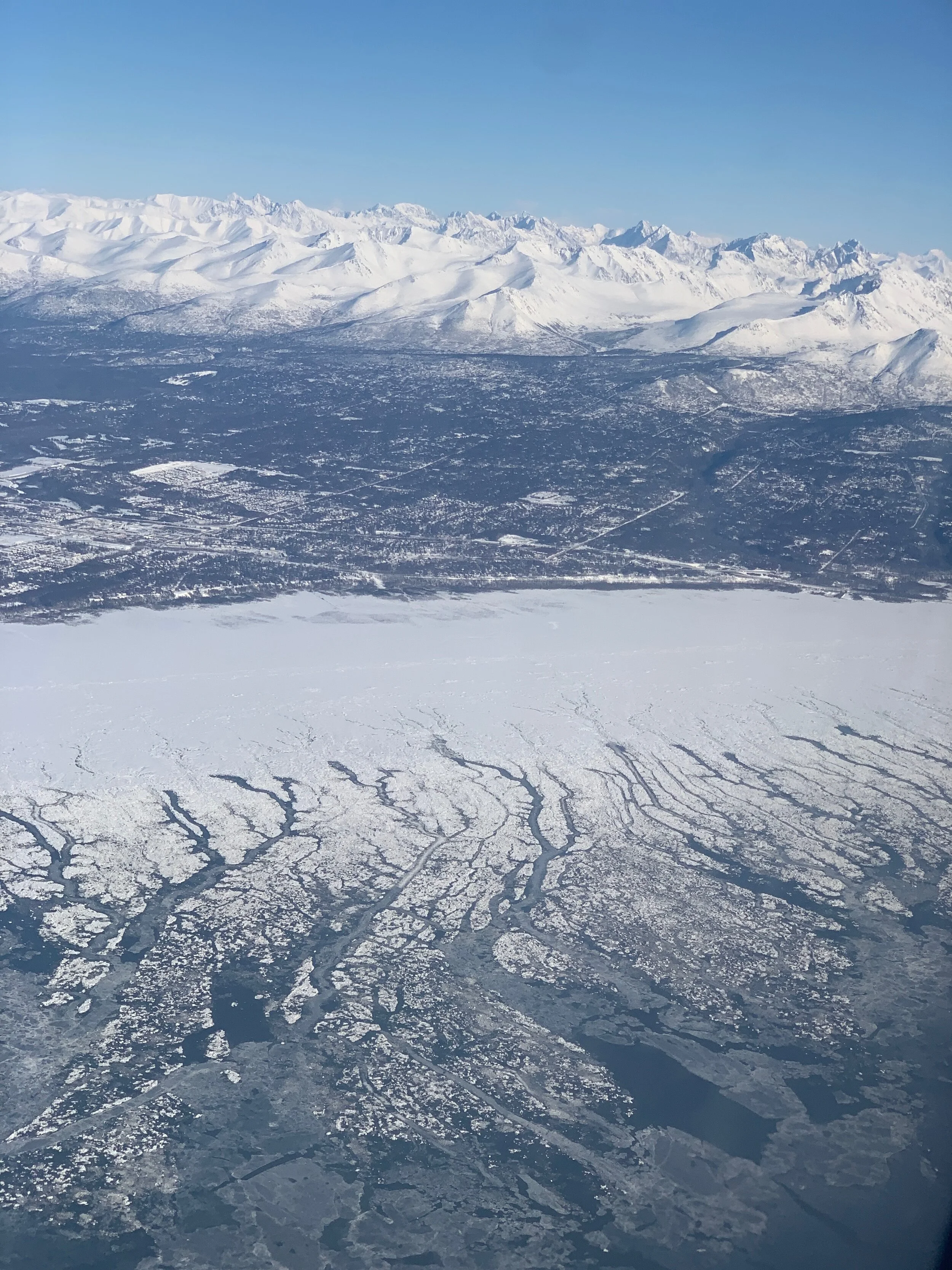 Look at this beautiful view from the plane! I’m about to land in Anchorage, Alaska.