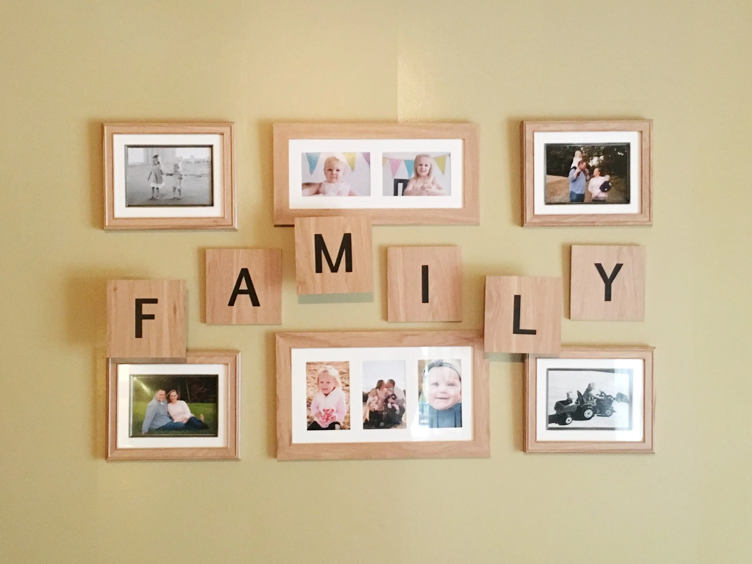 Our wall gallery with most photos by Rachel Mummert Photography and Leah Adkins Photography .