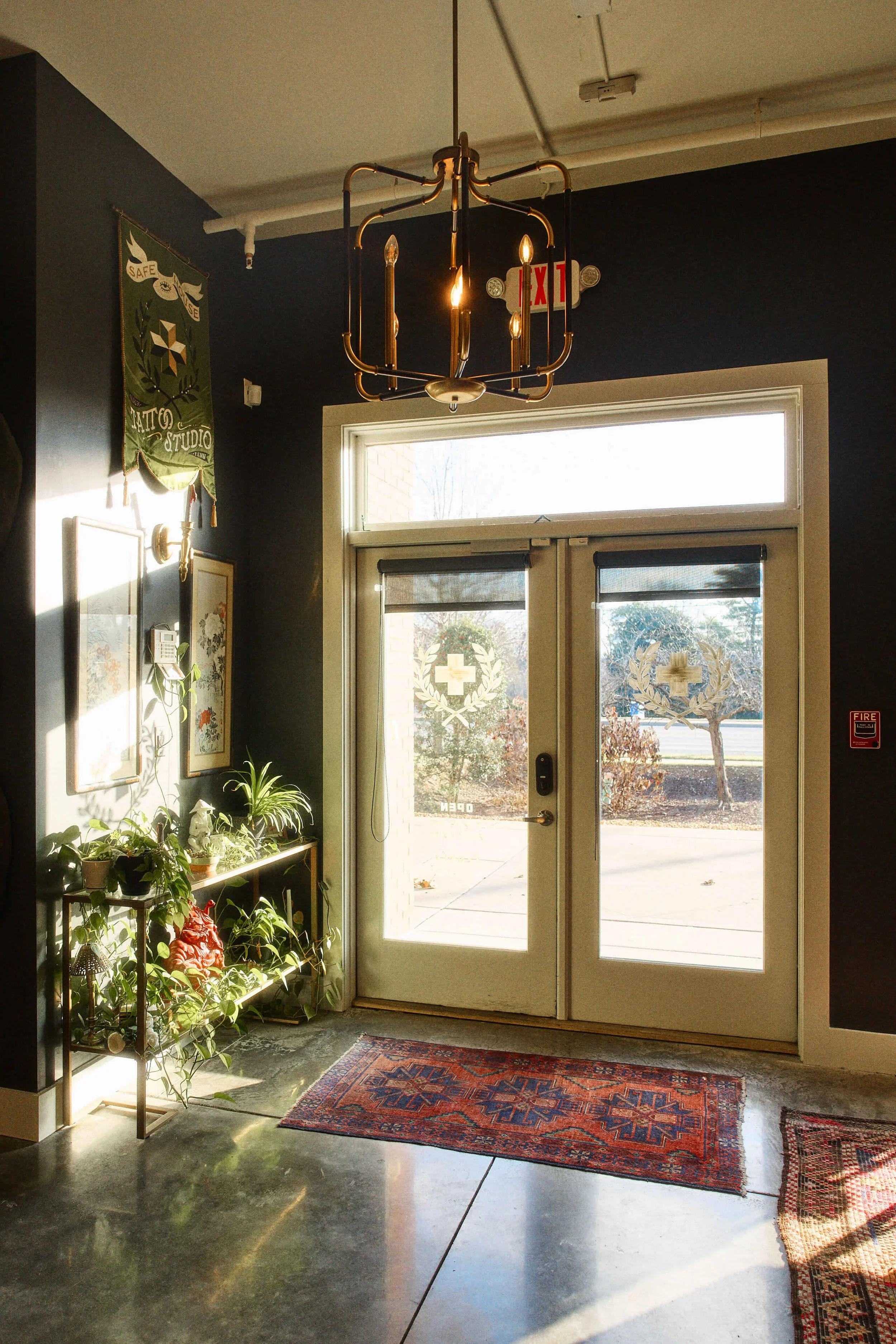 Front entrance and lobby area inside Safe House Tattoo Studio in Nashville Tennessee