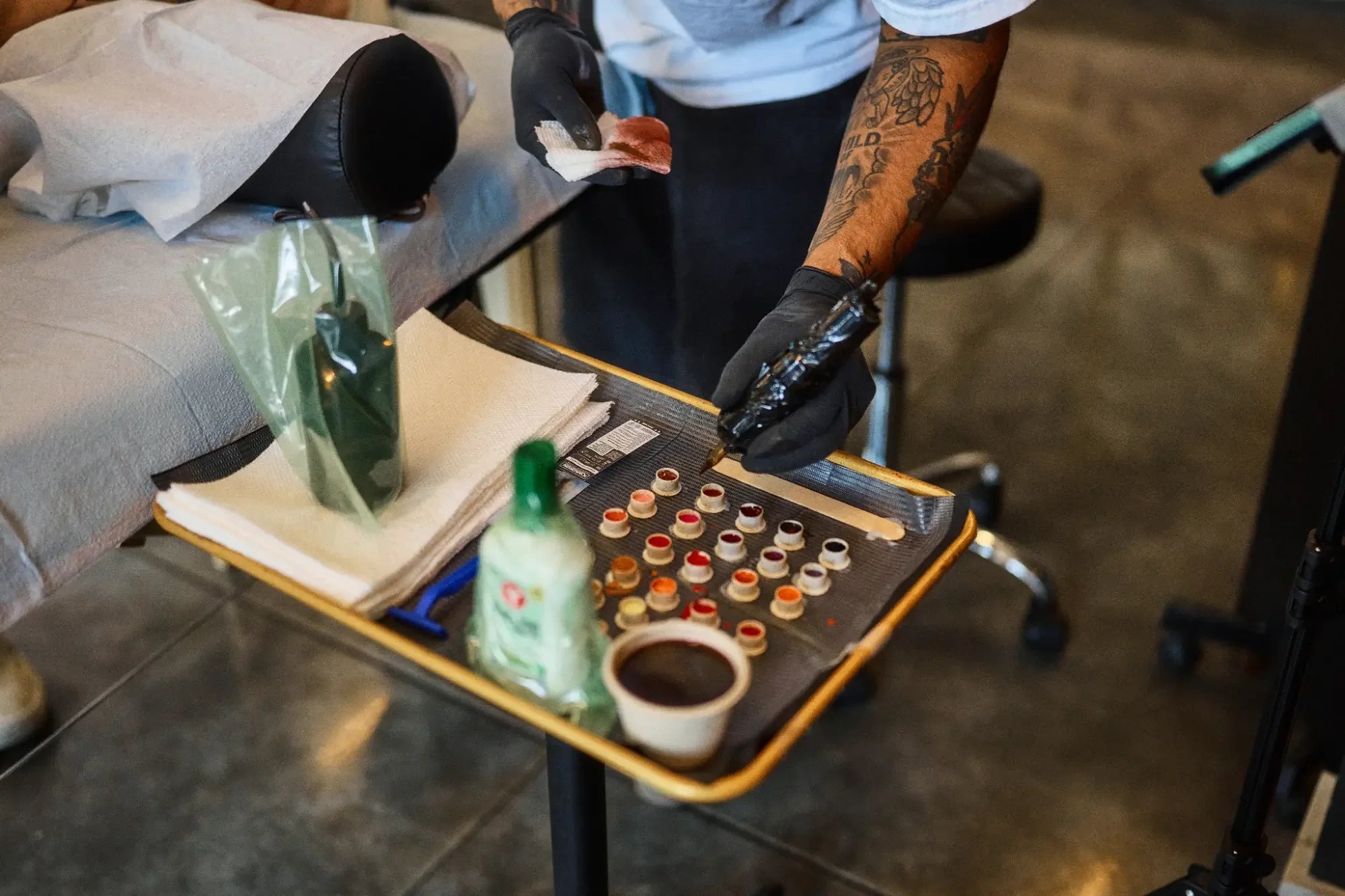 Tattoo artist Talon in Nashville sets up his station for the day.