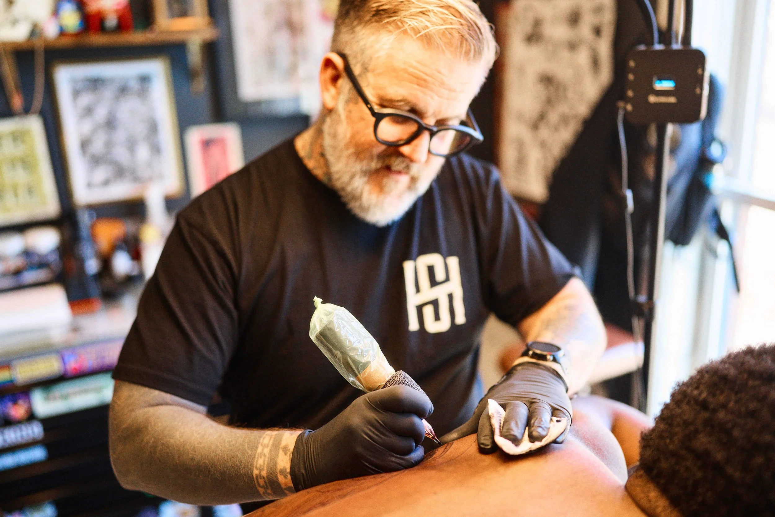 Ian White with client at Safe House Tattoo Studio