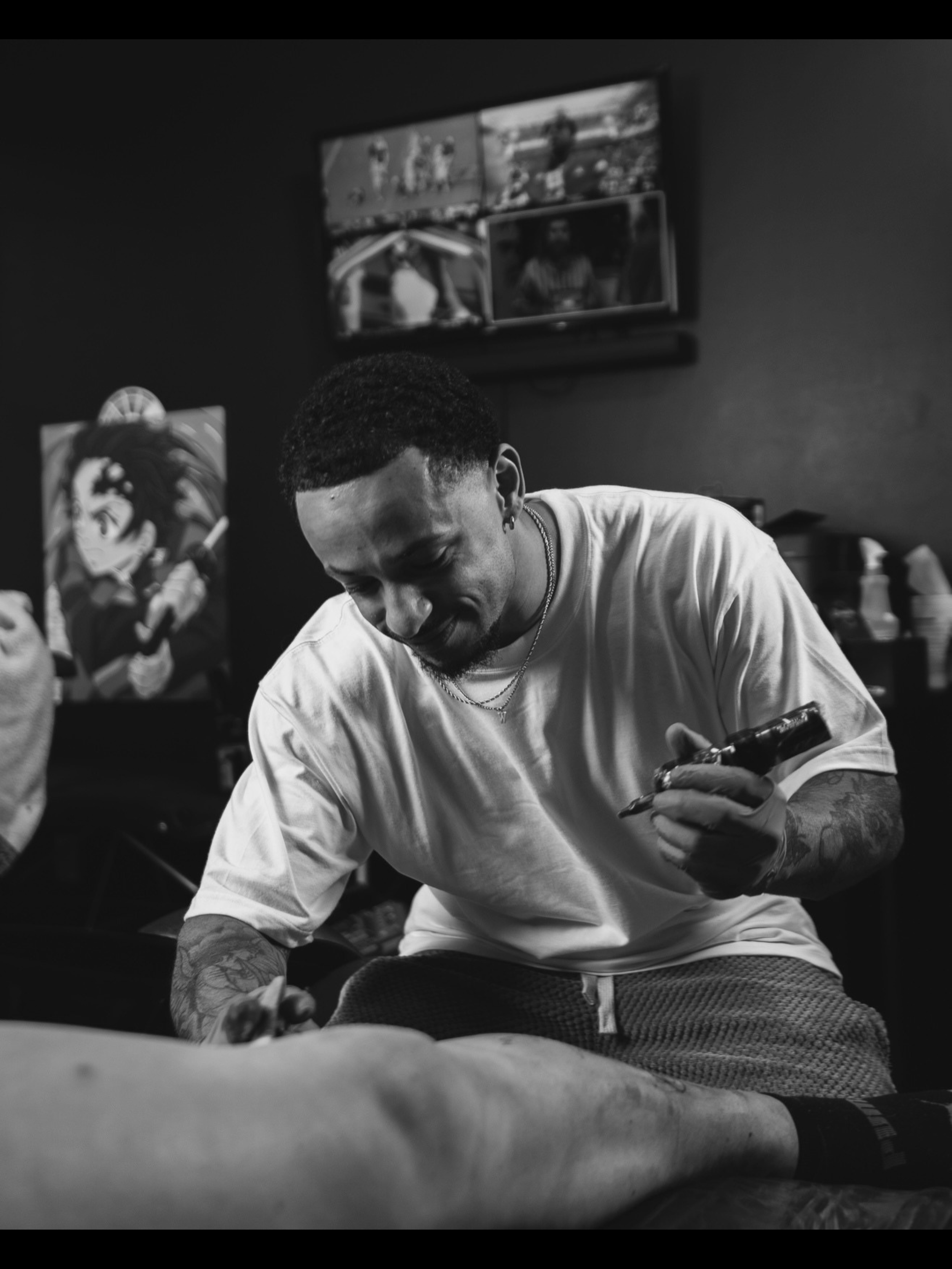 Portrait of Talon Pinckney, professional tattoo artist at Safe House Tattoo Studio in Nashville, Tennessee, specializing in anime, video game, and comic book tattoos.