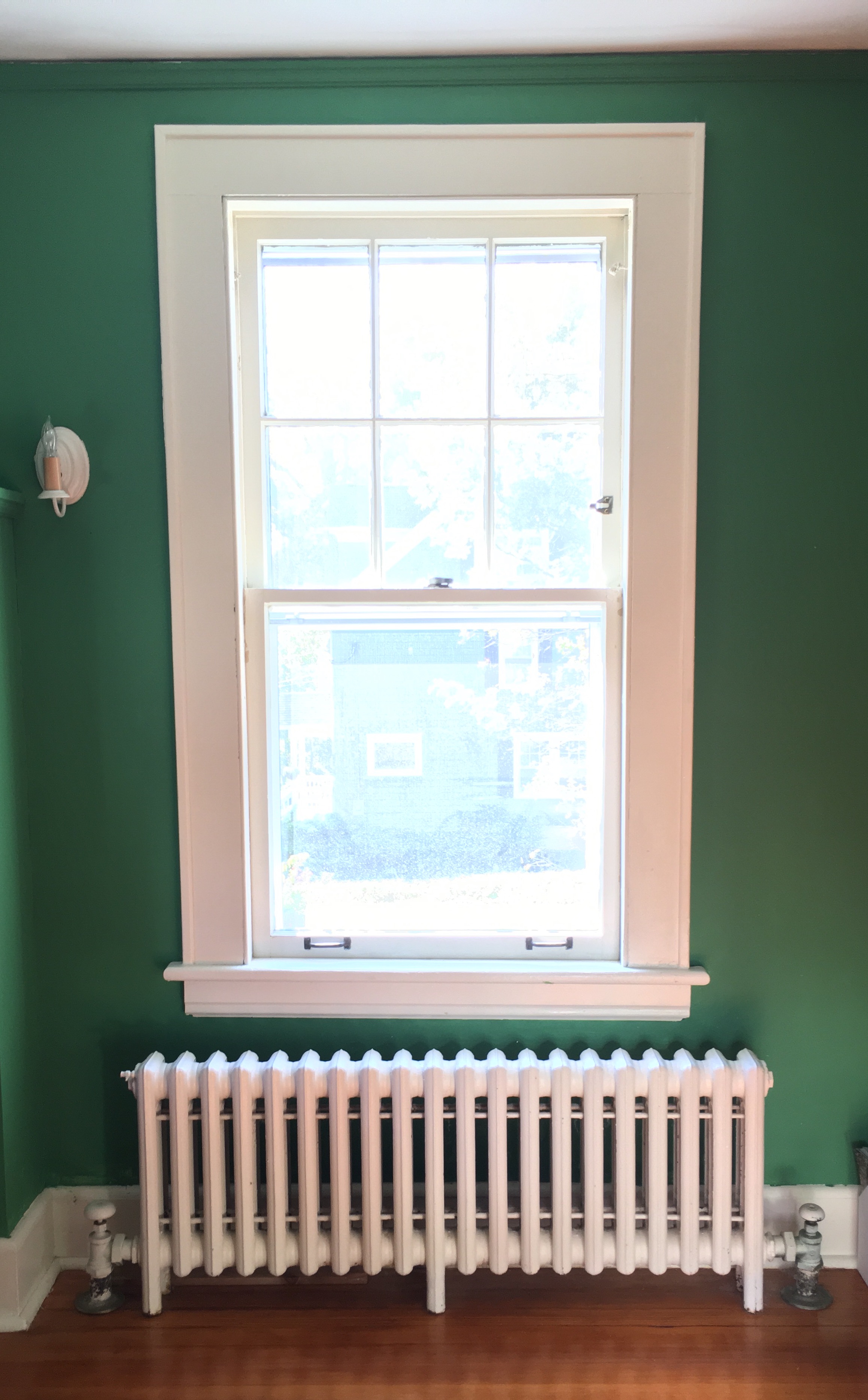 Once the walls were painted the windows almost looked worse against the stark contrast of the green.