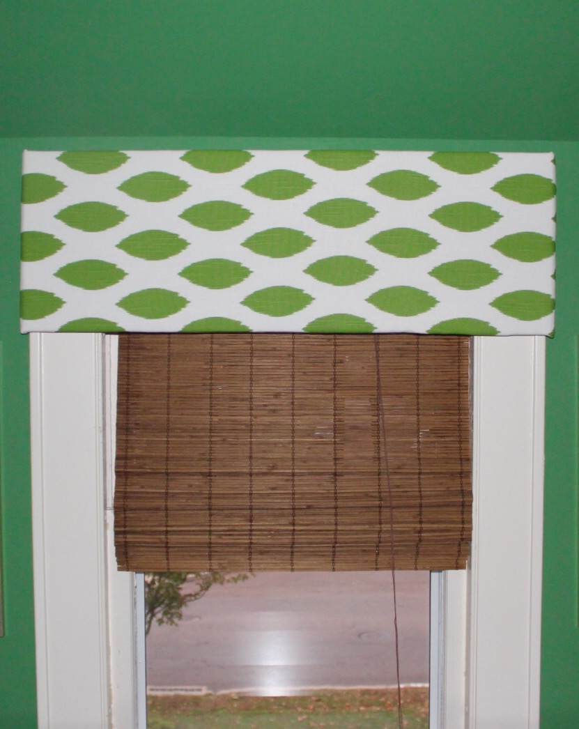 This DIY cornice board is an easy solution I've used throughout my own home. I like it in this space because it brings the print in and hides the hardware at the top of the window, but it doesn't take up much space. 