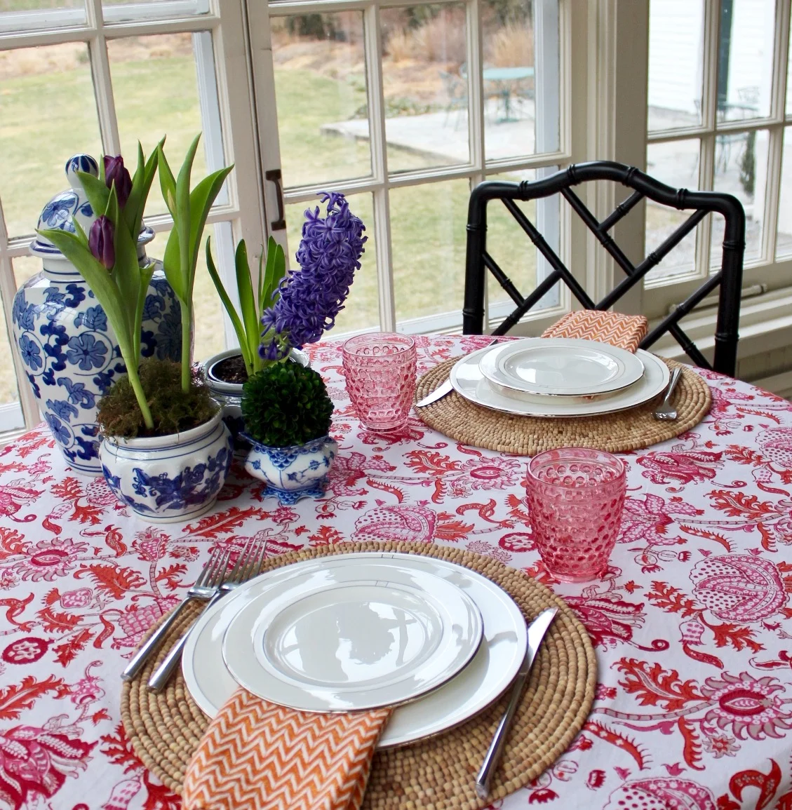 Fresh flowers don't need to be fussy. I'm not one for red roses, but I'll take potted springtime flowers any day! Also, I like to set the arrangements further back on the table so that you can actually see and talk with the other person.