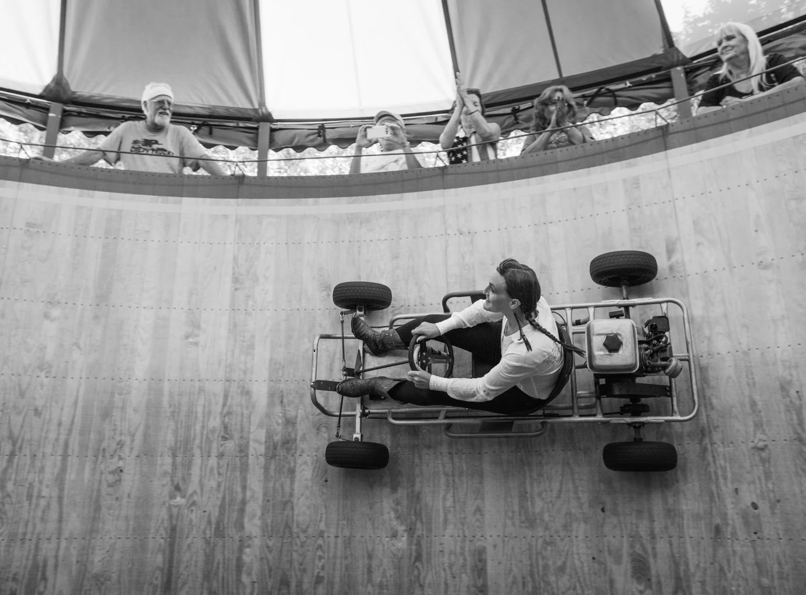 Samantha Stardust puts some rubber on the walls, taking the Wild Wheels racing go kart up for a spin.