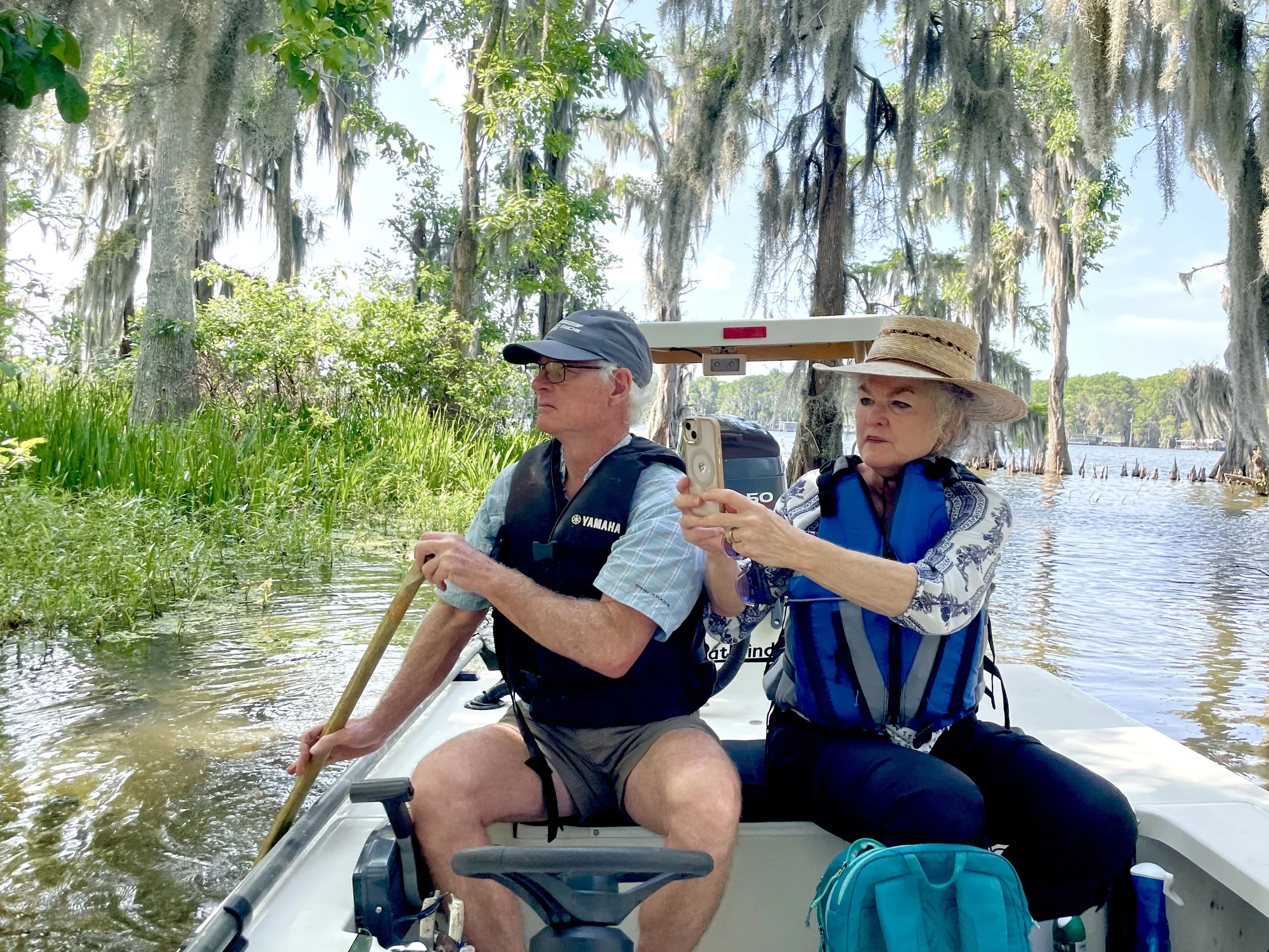 Collecting observations by boat at Lake Verret.