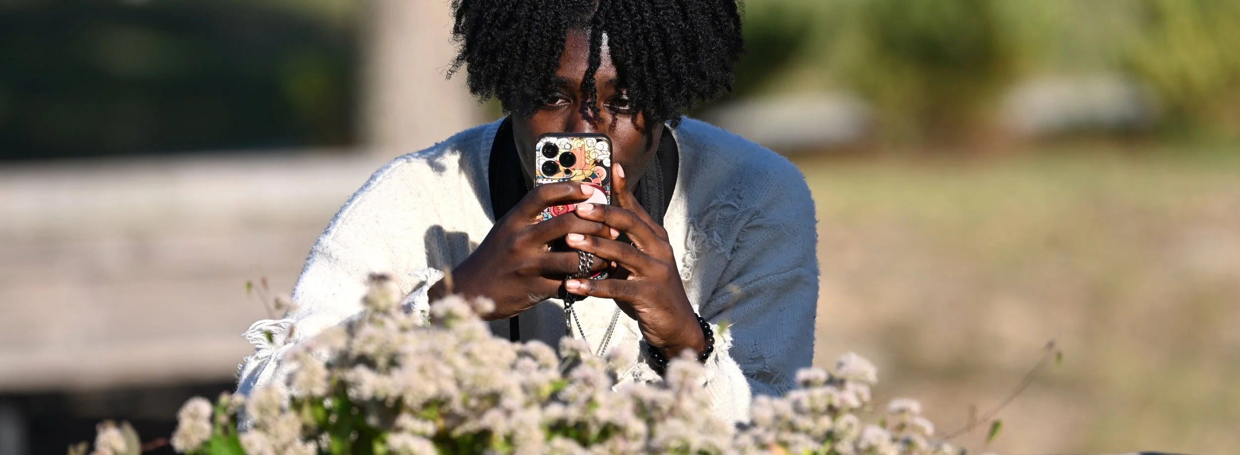 Student using iNaturalist to ID a bee