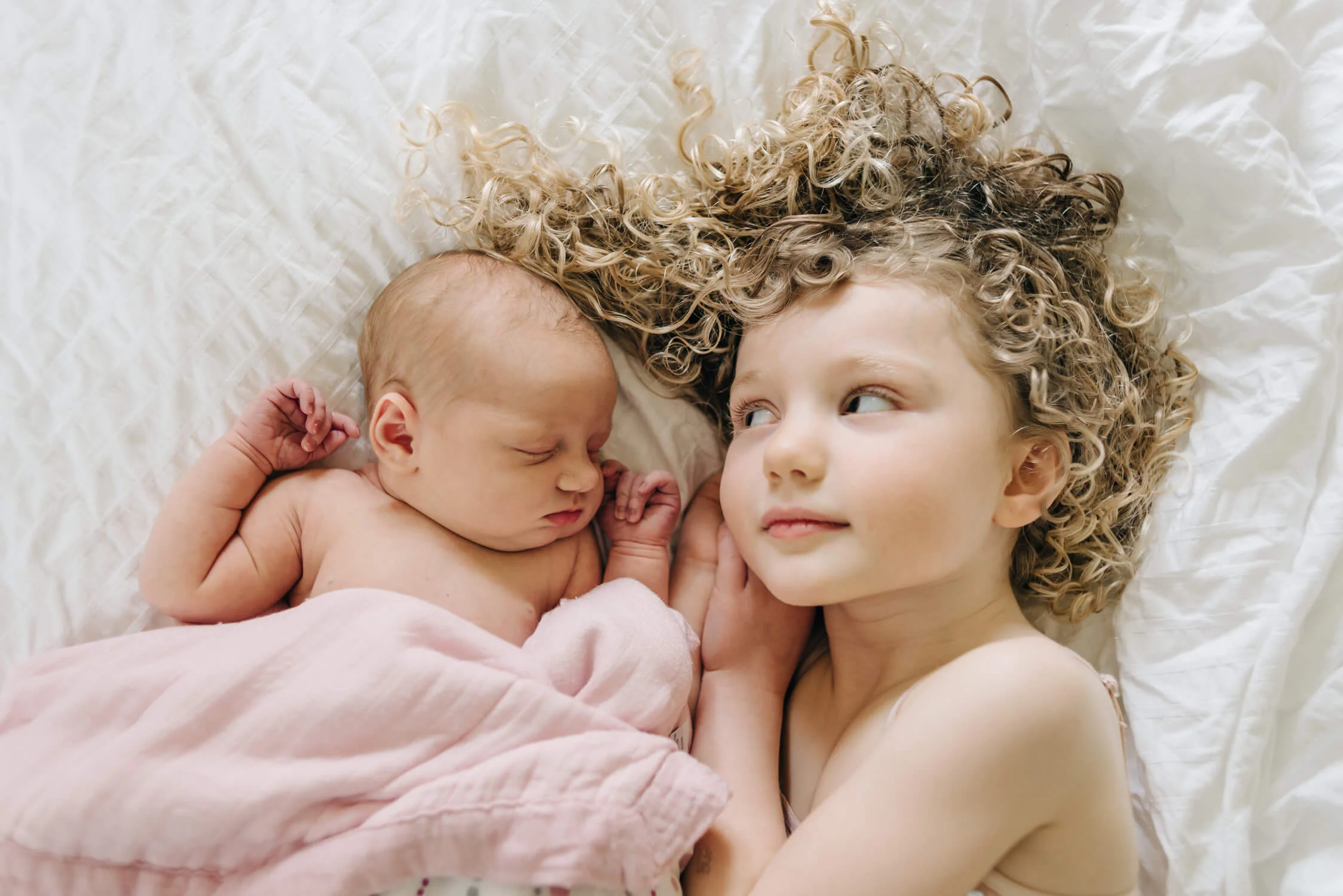 blonde curls new baby sister