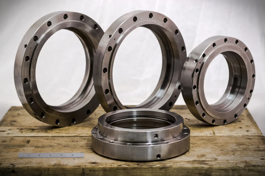 A family of machined steel flanges in graduated sizes