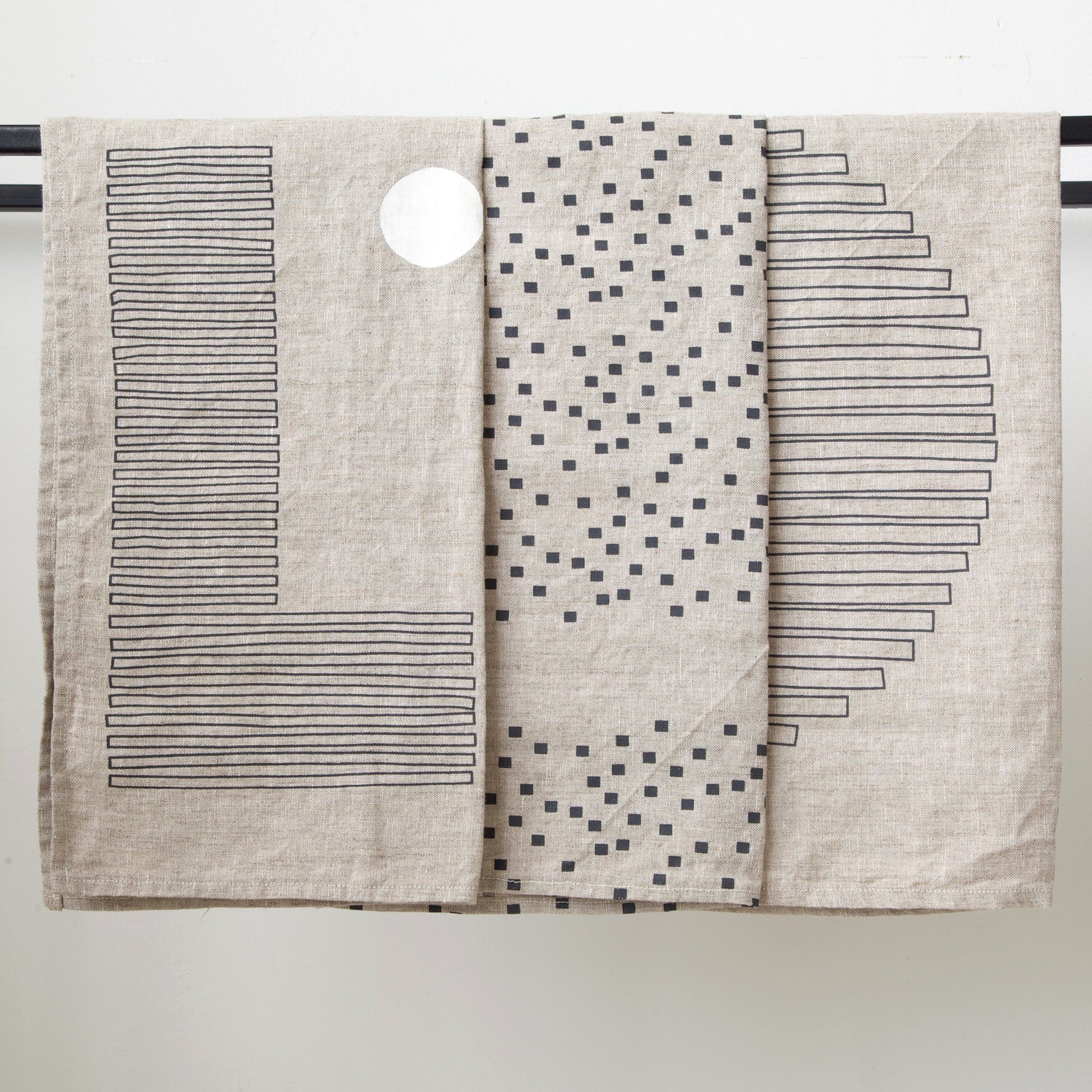 Charcoal Snippets Print on Stone Linen. Made from 100% European Linen and measures 18" x 18". Napkin has been prewashed. Shown here with Off Kilter and Stack Print.